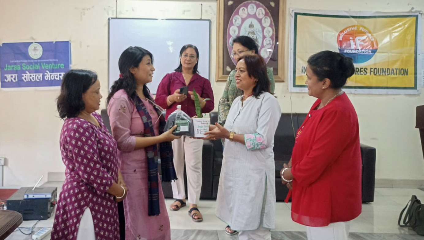 Community members learning composting methods